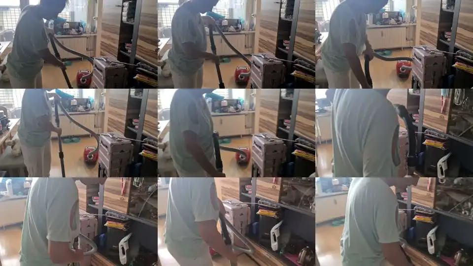 Braless downblouse while vacuuming