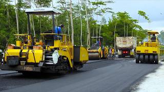 Asphalt Paving Work Using Road Construction Equipment And Trucks