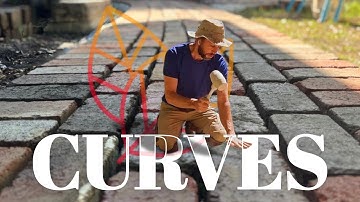 Crafting the Curve: Building a Brick Pathway Through the Garden