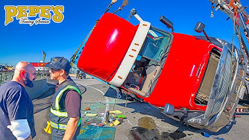 Driver Rolls Over Semi and Container Full of Scrap Metal