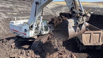 White Cat 385C Excavator Loading Coal On 4 Axle Mercedes & MAN Trucks - Interkat SA