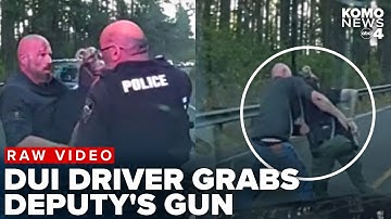 RAW VIDEO: Thurston County deputy fights with DUI suspect who grabbed her gun at crash scene