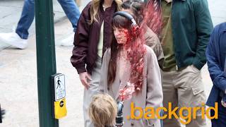 Dakota Johnson covered in fake blood while filming 'Verity' with Josh Hartnett in New York, NY