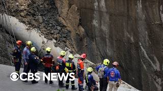Massive sinkhole in Bangkok swallows part of road