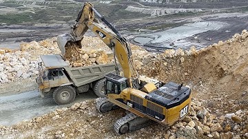 Cat 385C Excavator Loading Cat 775E Dumpers With Blasted Materials - Pyramis Ate