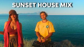 playing house music during golden hour on a cliff I carlito
