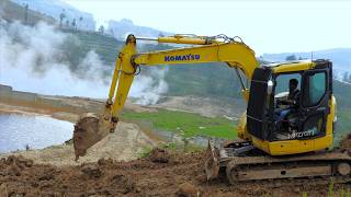 Mini Excavator Working On The Sileri Crater Making A Dirt Ramp