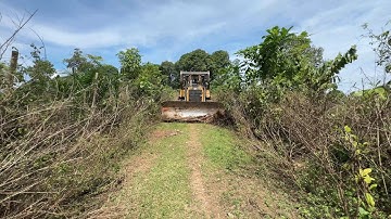 Bulldozer D6R XL Walking Home on the Mountain Plantation Road
