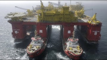 Jack-upgigant bouwt turbine op open zee. Documentaire over zware machines en industriële techniek.