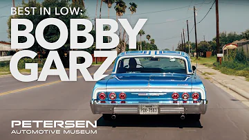 Bobby Garza  | The Texan Lowrider behind the Chevrolet Bel Air "Double Trouble"