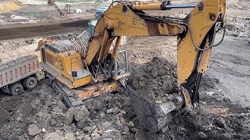 Liebherr 974 Excavator Loading Overburden On Mercedes & MAN 4 Axle Trucks - Ascon Ltd