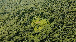An unbreakable grandmother in complete isolation among dense mountain forests far from civilization