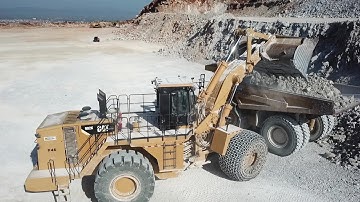 Caterpillar 992K Wheel Loader Loading Caterpillar 777F Dumpers - Interkat SA - Drone View