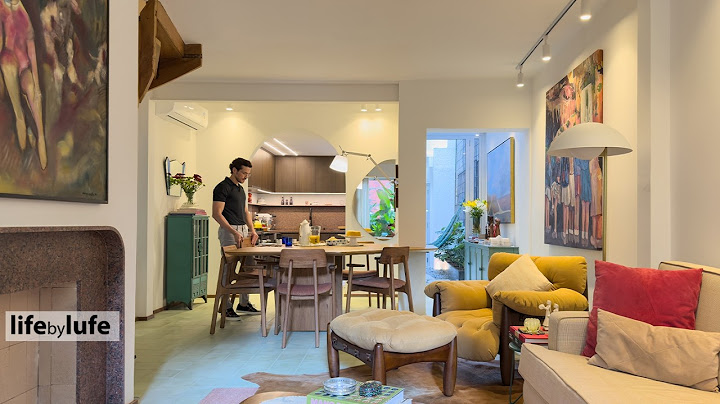 He lives in a hidden paradise - a village house with gardens that look like an oasis in the city
