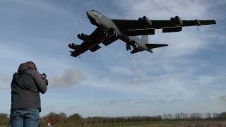 B-52 bomber planes launch from UK blowing smoke on a deployment to Europe