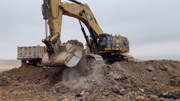 Caterpillar 6015B Excavator Loading Mercedes & MAN 4 Axle Trucks - Sotiriaidis Mining Works